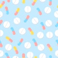 Colorful pills seamless pattern. Vector background pharmaceutical. Seamless texture realistic tablets on blue background